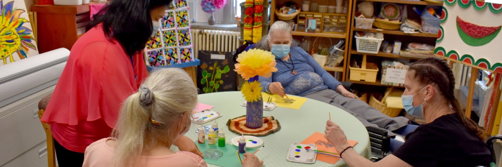 staff and residents making crafts